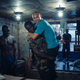 Chinese and local sailors take a break between shifts on board a fishing vessel off the coast of Guinea Bissau.